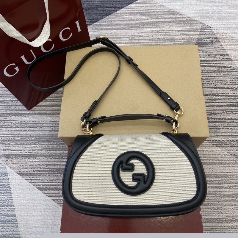 G*u*i top handle bags